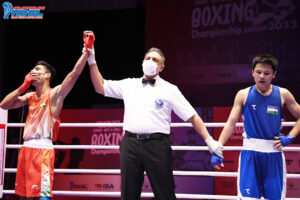 Anand Yadav (in Red) reacts after winning the youth boys' 54kg semi-final at the 2022 ASBC Asian Youth & Junior Boxing Championships in Amman, Jordan on Friday, March 11, 2022