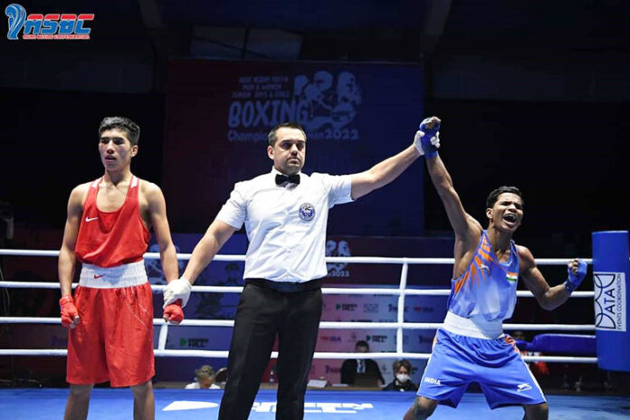 India's Vishwanath Suresh celebrates after winning youth men 48kg gold medal at the 2022 ASBC Asian Youth & Junior Boxing Championships in Amman, Jordan