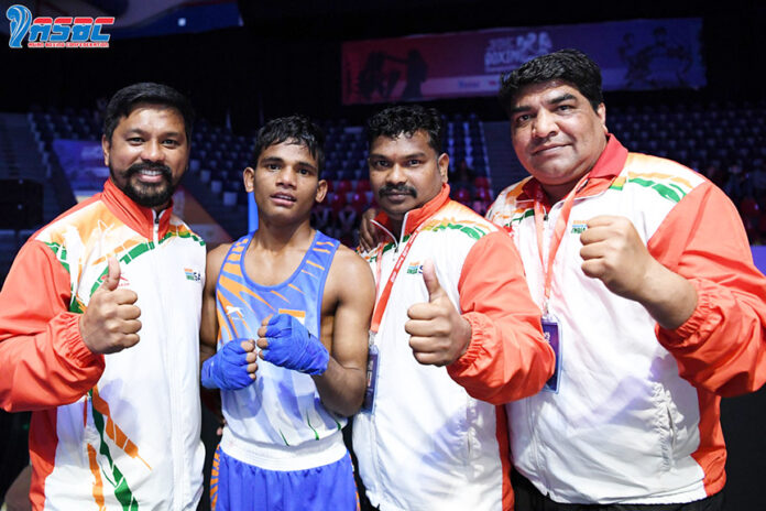 Ravi Saini poses with the coaches after winning 48kg junior boys semi-final at the 2022 ASBC Asian Youth & Junior Boxing Championship in Amman Jordan on Thursday, March 10,