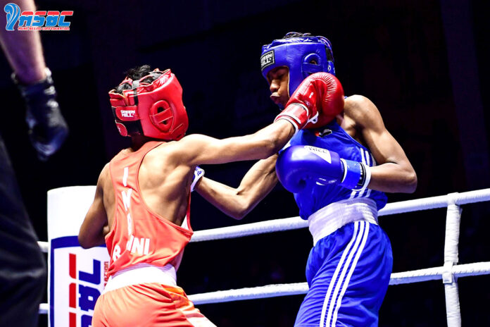 Ravi Saini (in Red) in action during the 48kg junior boys opening round match at the 2022 ASBC Asian Youth & Junior Boxing Championship in Amman Jordan