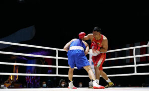 Indian boxer Gaurav Chauhan (in Red) in action during men's 91kg quarter-final against Aibek Oralbay of Kazhakstan at the 2022 Thailand Open International Boxing Tournament in Phuket on Tuesday, April 5, 2022