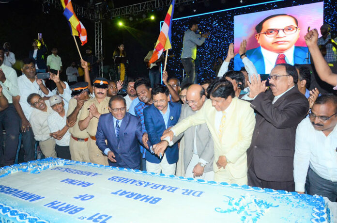 Dr.Harshdeep Kamble IAS, CEO of Jai Bheem App Girish Wankhede celebrates and cuts cake on 131st Dr.Babasaheb Ambedkar Jayanti