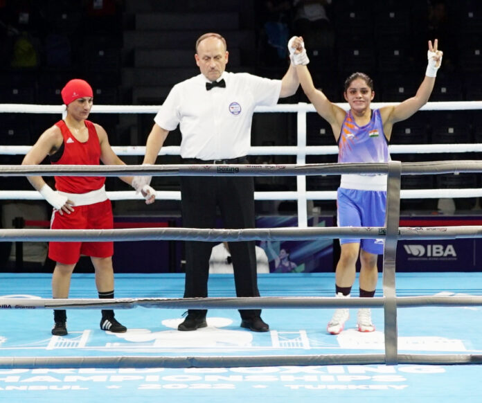 India’s Anamika (in Blue) celebrates after her 5-0 win against Romania's Eugenia Anghel at the 12th IBA Women’s World Boxing Championships in Istanbul