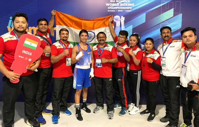 India's Nikhat Zareen poses with coaches after winning gold medal at the 12th IBA Women's World Boxing Championships in Istanbul