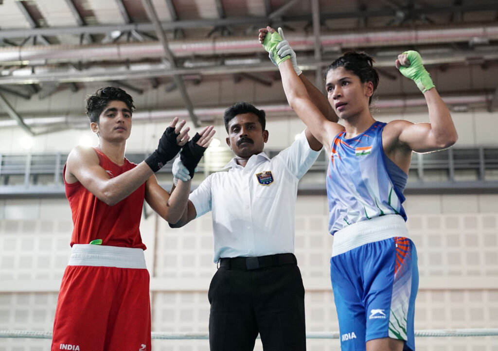 Nikhat Zareen (in Blue) celebrates after winning the 50kg final at the 2022 Commonwealth Games trials at the Indira Gandhi Indoor Stadium in New Delhi 