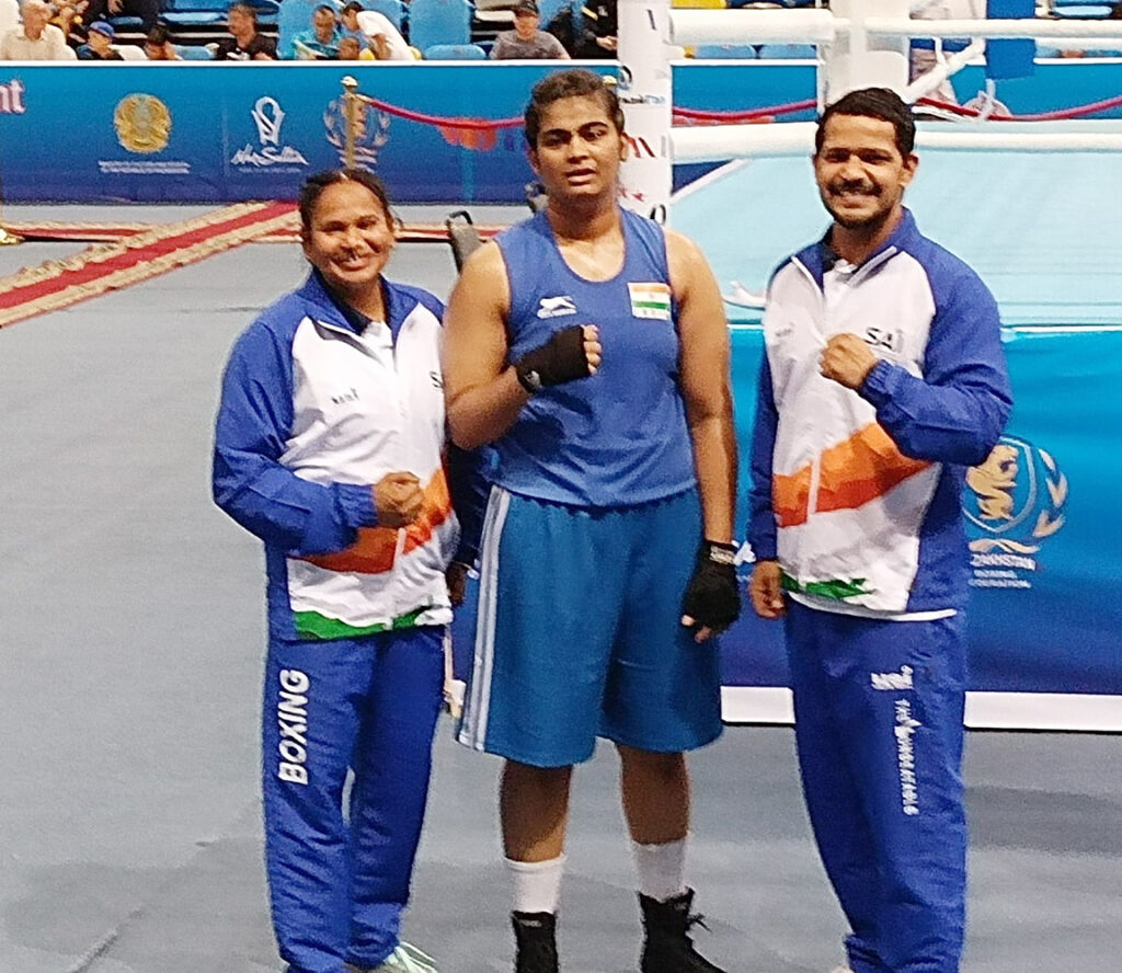 Indian boxer Alfiya Pathan poses along with the coaches after winning gold medal in the women's +81kg of Elorda Cup in Nur-Sultan, Kazakhstan on Monday, July 4, 2022