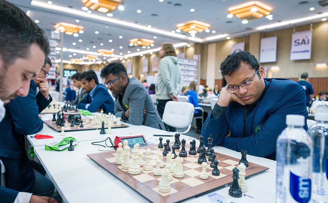 India's Open C team in action during Round 9 of the 44th Chess Olympiad on Sunday in Mamallapuram, Tamil Nadu. Photo credit - Lennart Ootes 