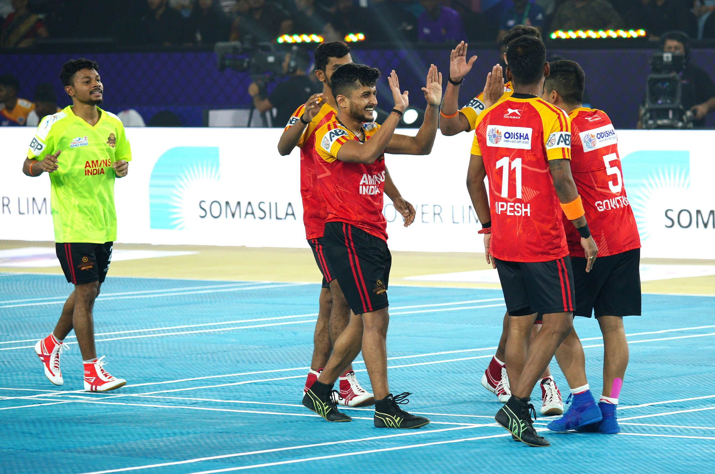 Odisha Juggernauts' players celebrate their win against Telugu Yoddhas in Ultimate Kho Kho Season 1 in Pune on Sunday, August 28, 2022