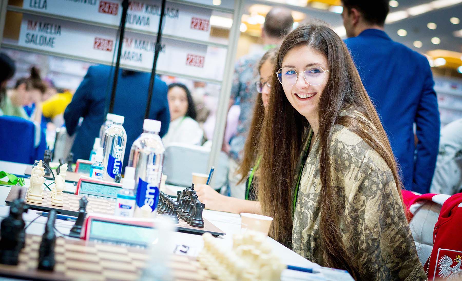 Poland's Oliwia Kiolbasa in action in Round 10 of the 44th Chess Olympiad in Mamallapuram, Tamil Nadu on Monday.  photo credit : FIDE/Lennart Ootes & Stev Bonhage