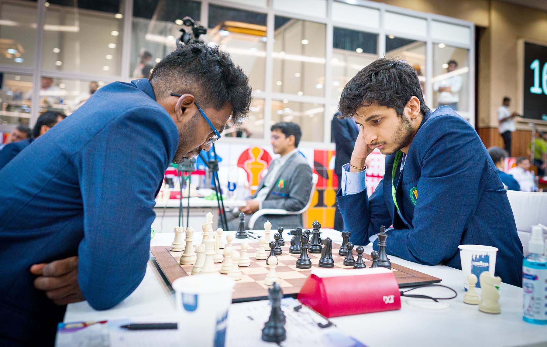 Vidit Gujrathi of India's Open Team A facing S. P. Sethuraman of India's Open Team C in Round 7 of the 44th Chess Olympiad on Friday in Mamallapuram, Tamil Nadu. photo credit : FIDE/Lennart Ootes & Stev Bonhage