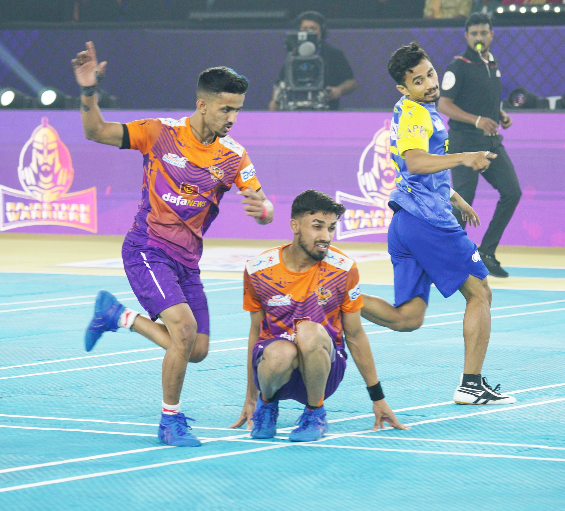 Players in action during Ultimate Kho Kho Season 1 match between Gujarat Giants and Rajasthan Warriors in Pune on Wednesday