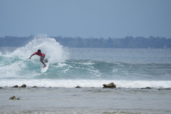 Image 3 - Surfer in action